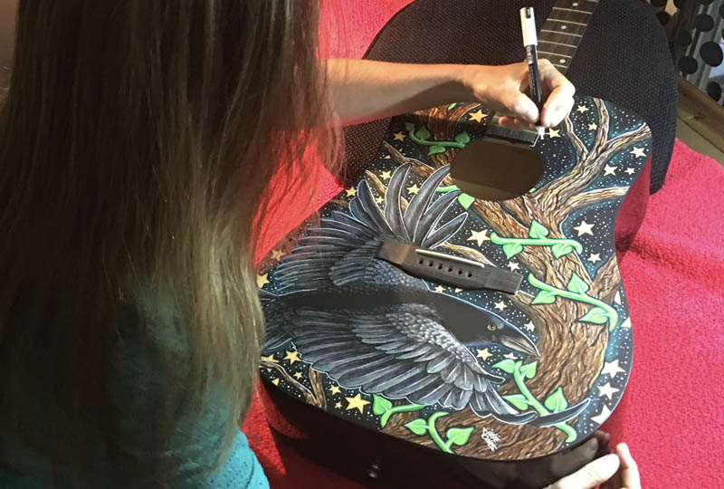 art painted on a guitar