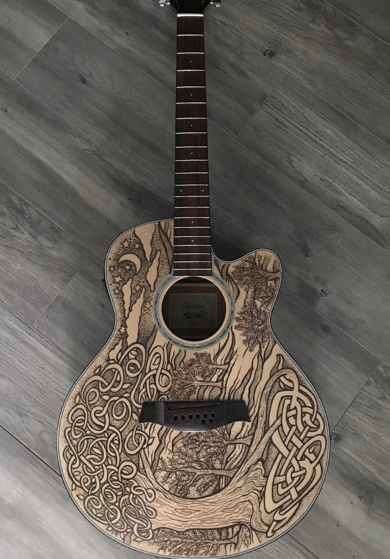 painted guitar with custom design