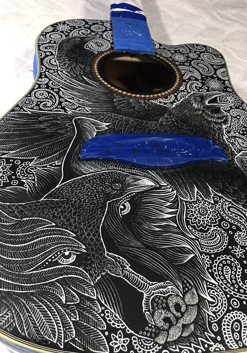 painted guitar with custom design