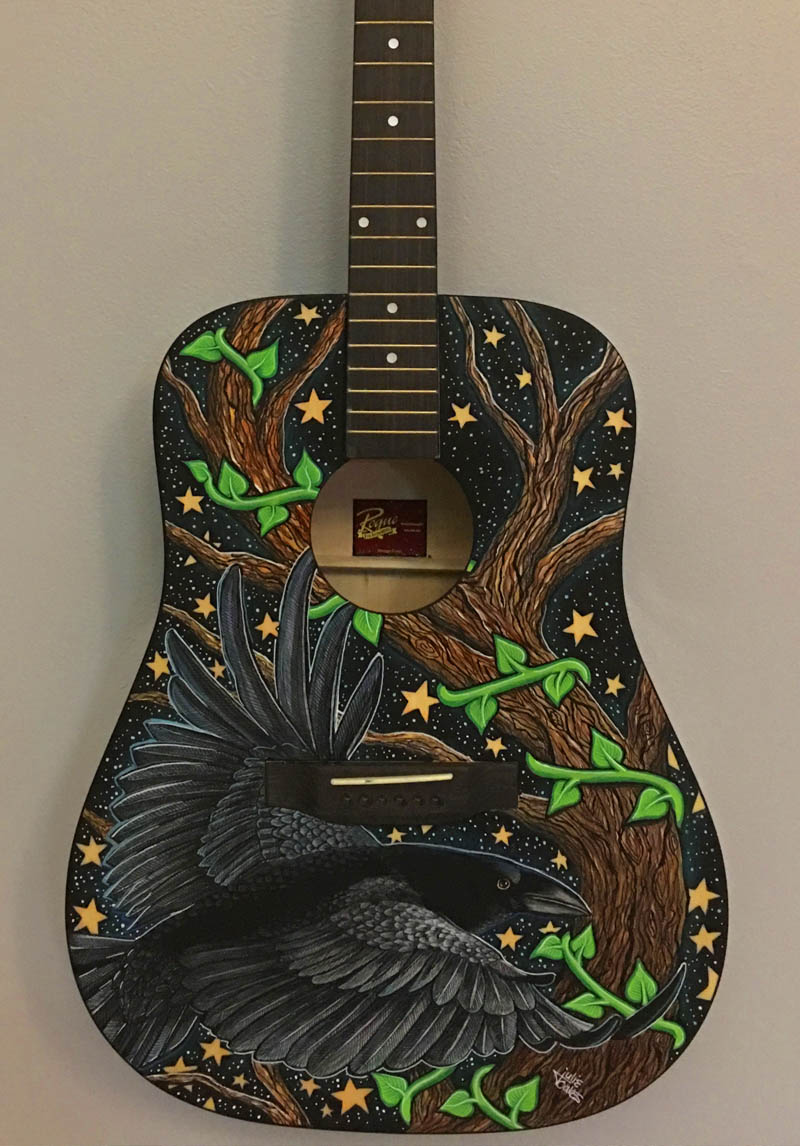 painted guitar with custom design